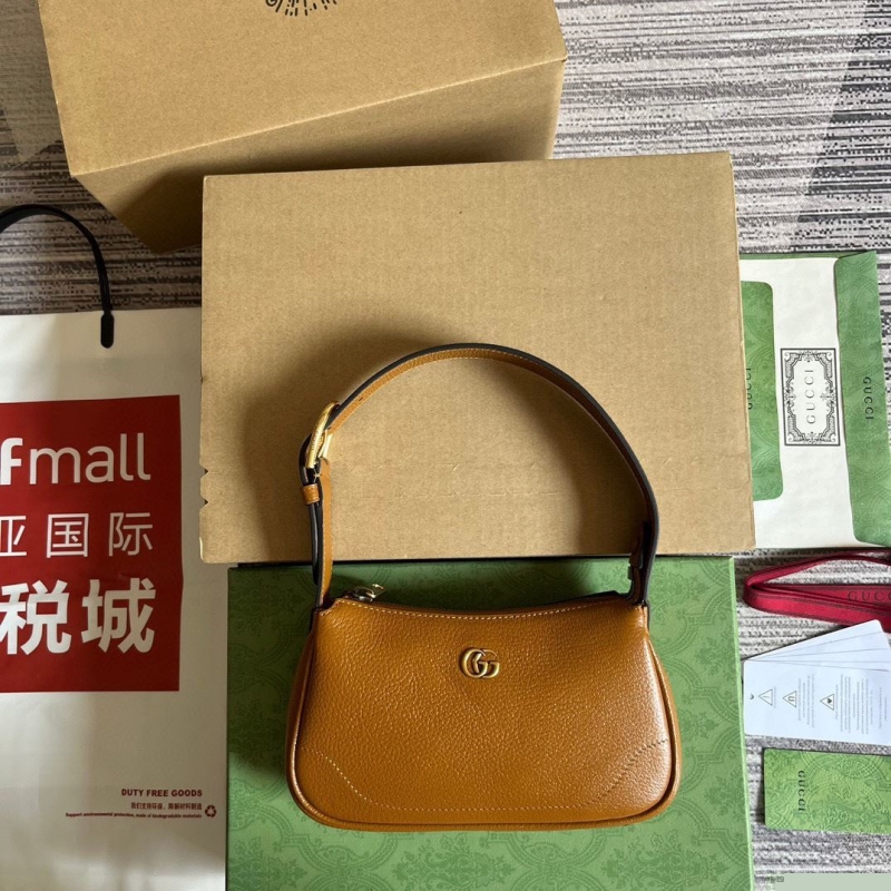 G*u*i top handle bags